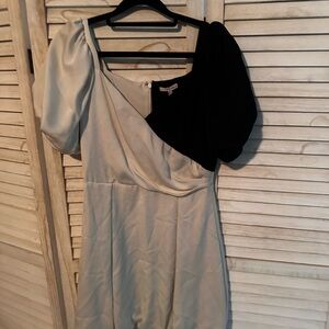 Elegant Black and Cream Mini Dress